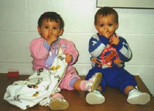 Their first birthday was spent behind bars.